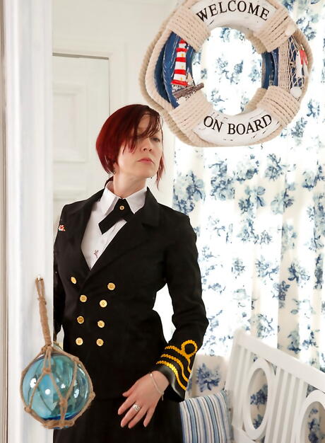 Curious british redheaded mature Scarlet Rose in uniform outfit exposes her butt and hairy beaver 